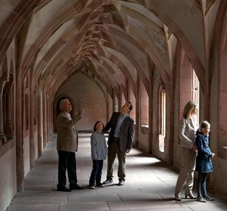 Visitors in the cloister at Alpirsbach Monastery