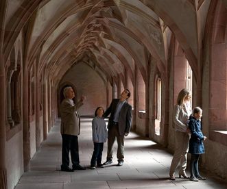 Visitors in the cloister at Alpirsbach Monastery